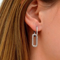Boucle d'oreille homme signification : un symbole de style et de  personnalité